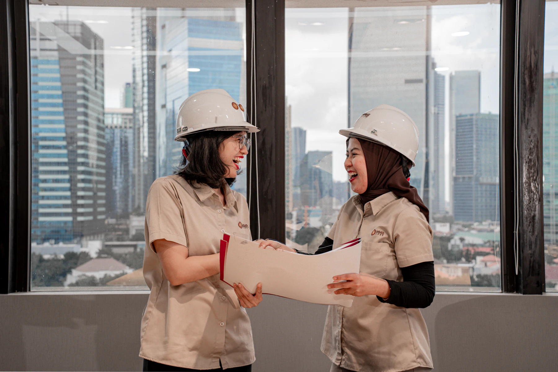 Technical staff reviewing drawings